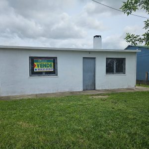 CASA DOS DORMITORIOS , EN ECILDA PAULLIER . GRAN TERRENO
